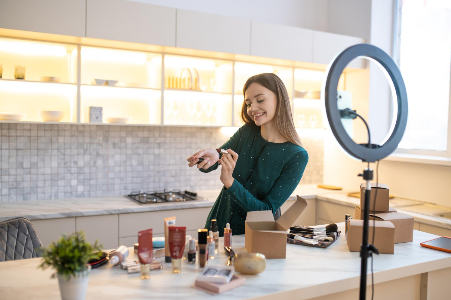 pretty-woman-demonstrating-new-cosmetics-looking-involved